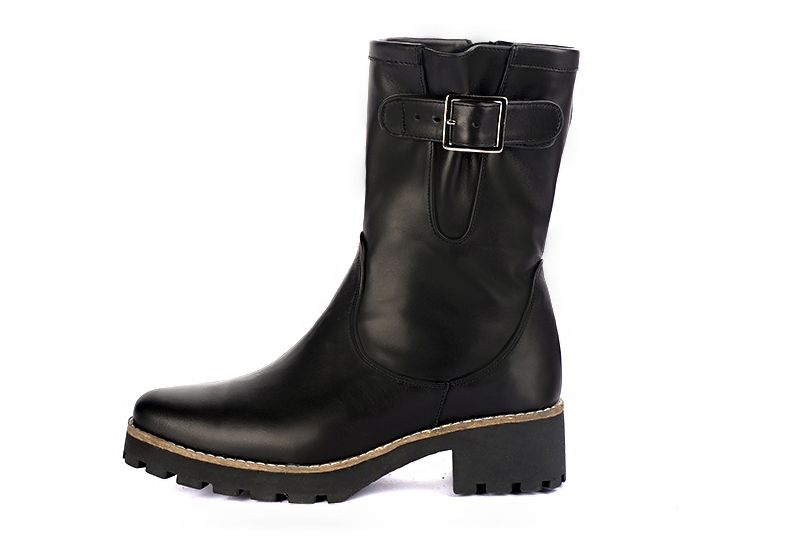 Satin black women's ankle boots with buckles on the sides. Round toe. Low rubber soles. Profile view - Florence KOOIJMAN